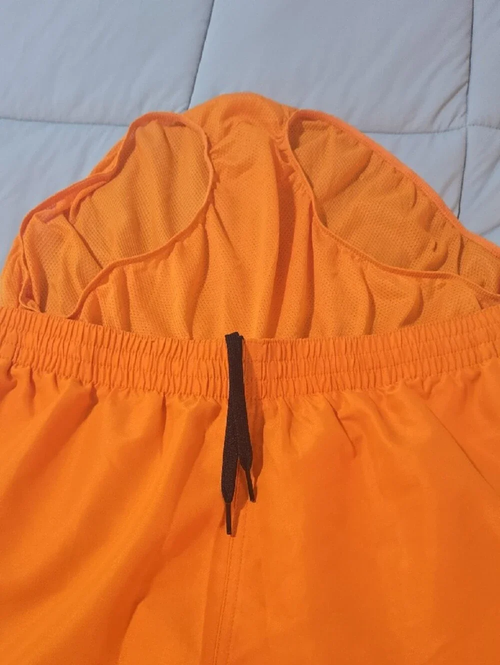 Nike Men’s Bright Orange Athletic Shorts with White Swoosh